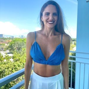 Crop Top is made from a denim base. Complete with adjustable tank straps